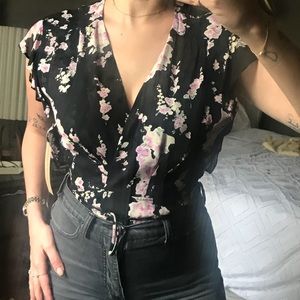 REFORMATION, BLACK FLORAL WRAP BLOUSE SIZE M